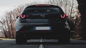 Preview wallpaper mazda 3, mazda, car, black, back view, road