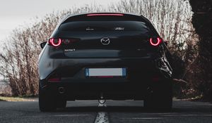 Preview wallpaper mazda 3, mazda, car, black, back view, road