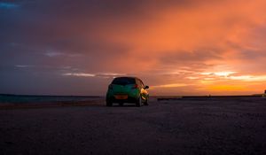 Preview wallpaper mazda, car, sunset, sky, clouds