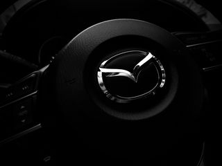 320x240 Wallpaper mazda, steering wheel, logo