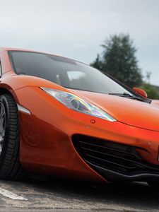 Preview wallpaper mclaren, car, orange, headlight