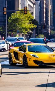 Preview wallpaper mclaren, car, sports car, yellow, road