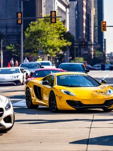 Preview wallpaper mclaren, car, sports car, yellow, road