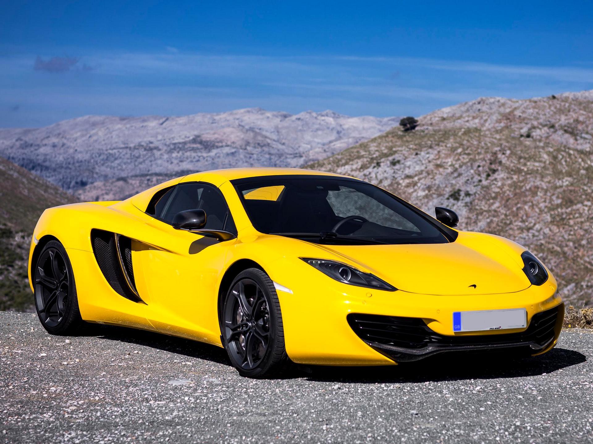 Желтая машина название. Макларен 12c Спайдер. MCLAREN 12c. MCLAREN mp4-12c. Макларен 420s.