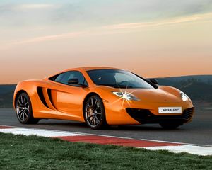 Preview wallpaper mclaren mp4-12c, track, orange, side view, twilight