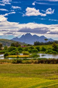 Preview wallpaper meadow, grass, mountains, river, landscape, nature