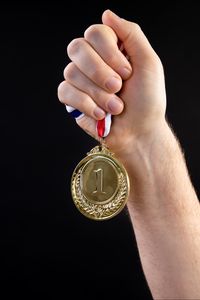 Preview wallpaper medal, victory, hand, sport, black