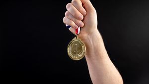 Preview wallpaper medal, victory, hand, sport, black