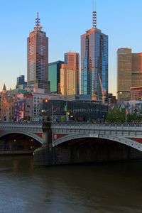 Preview wallpaper melbourne, river, yarra, bridges, buildings, skyscrapers