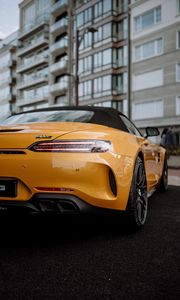 Preview wallpaper mercedes, car, sports car, yellow, tailight, back view