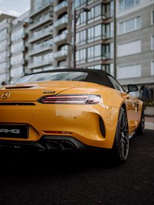 Preview wallpaper mercedes, car, sports car, yellow, tailight, back view