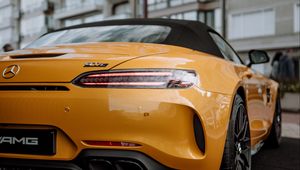 Preview wallpaper mercedes, car, sports car, yellow, tailight, back view