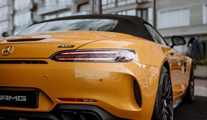 Preview wallpaper mercedes, car, sports car, yellow, tailight, back view