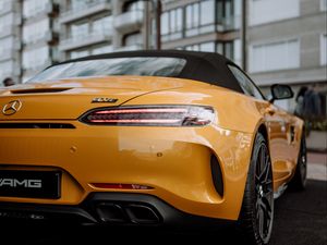 Preview wallpaper mercedes, car, sports car, yellow, tailight, back view