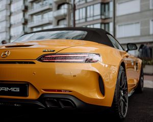 Preview wallpaper mercedes, car, sports car, yellow, tailight, back view