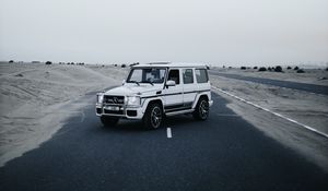 Preview wallpaper mercedes, car, suv, white, road, desert