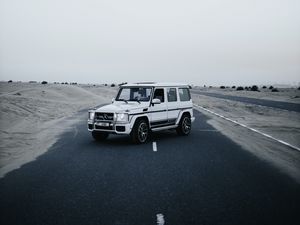 Preview wallpaper mercedes, car, suv, white, road, desert