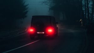 Preview wallpaper mercedes, car, tailights, road, fog, dark