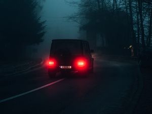 Preview wallpaper mercedes, car, tailights, road, fog, dark