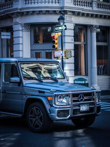 Preview wallpaper mercedes g-class, mercedes, g-wagen, suv, silver, city, movement