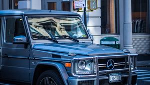 Preview wallpaper mercedes g-class, mercedes, g-wagen, suv, silver, city, movement