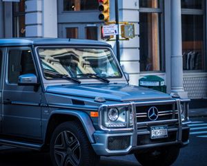 Preview wallpaper mercedes g-class, mercedes, g-wagen, suv, silver, city, movement