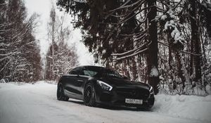 Preview wallpaper mercedes-benz, car, sportscar, black, snow, forest