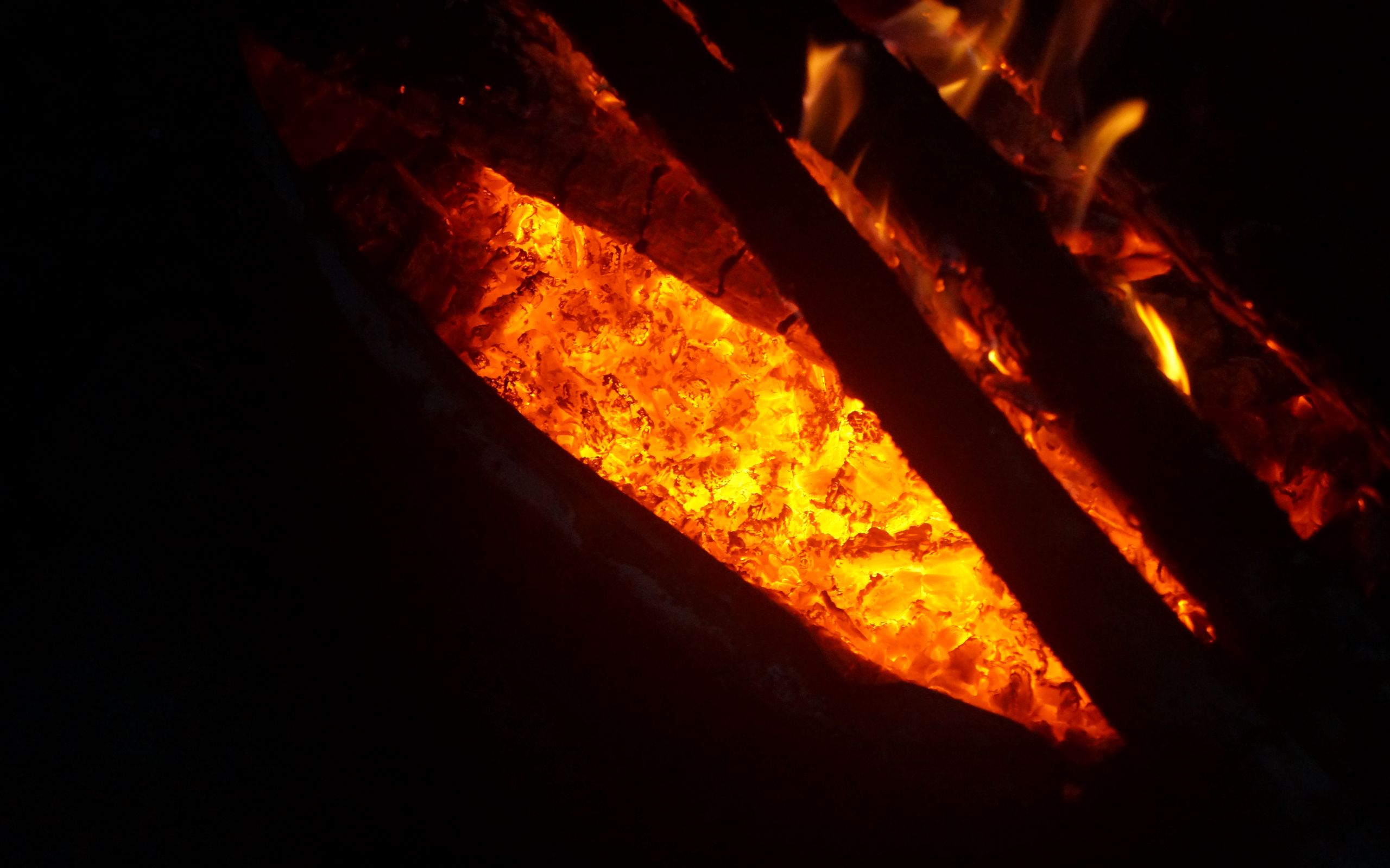 2560x1600 Wallpaper metal, burning, hot, light, dark