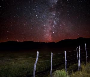 Preview wallpaper milky way, fence, mountains, night