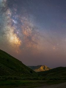 Preview wallpaper milky way, hills, grass, night