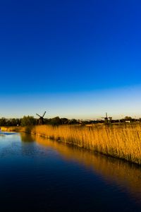 Preview wallpaper mills, grass, lake