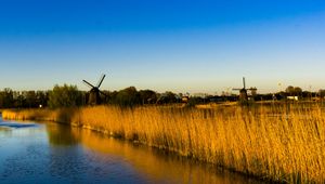 Preview wallpaper mills, grass, lake