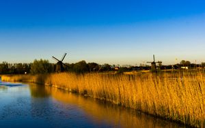 Preview wallpaper mills, grass, lake