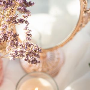 Preview wallpaper mirror, flowers, candle, light, aesthetics