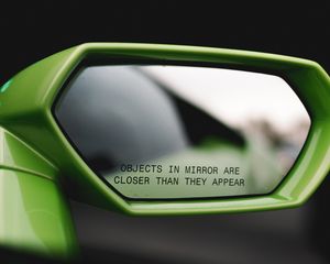 Preview wallpaper mirror, inscription, car, phrase