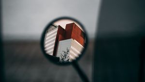 Preview wallpaper mirror, reflection, building, motorcycle