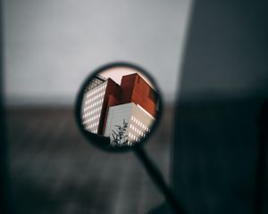 Preview wallpaper mirror, reflection, building, motorcycle