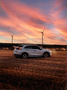 Preview wallpaper mitsubishi eclipse cross, mitsubishi, vehicle, suv, white, field, sunset