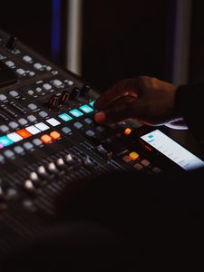 Preview wallpaper mixing console, hand, music, buttons, mixing