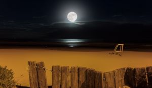 Preview wallpaper moon, beach, fence, sea, night
