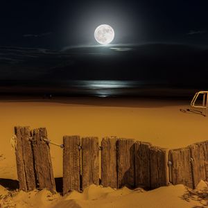 Preview wallpaper moon, beach, fence, sea, night