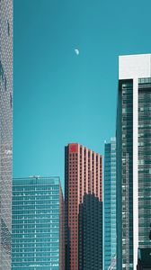 Preview wallpaper moon, buildings, city, facade, architecture