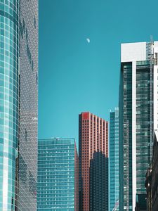 Preview wallpaper moon, buildings, city, facade, architecture