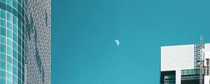 Preview wallpaper moon, buildings, city, facade, architecture