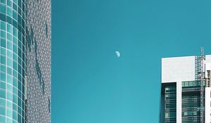 Preview wallpaper moon, buildings, city, facade, architecture