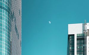 Preview wallpaper moon, buildings, city, facade, architecture