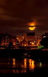 Preview wallpaper moon, clouds, city, dark