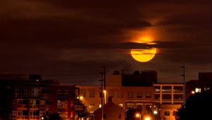 Preview wallpaper moon, clouds, city, dark