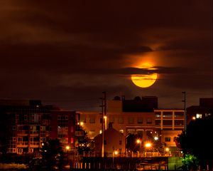 Preview wallpaper moon, clouds, city, dark