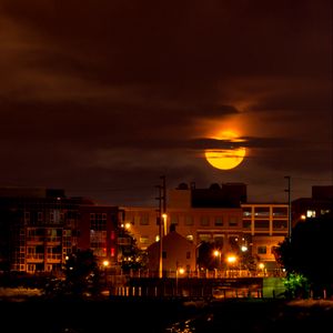 Preview wallpaper moon, clouds, city, dark